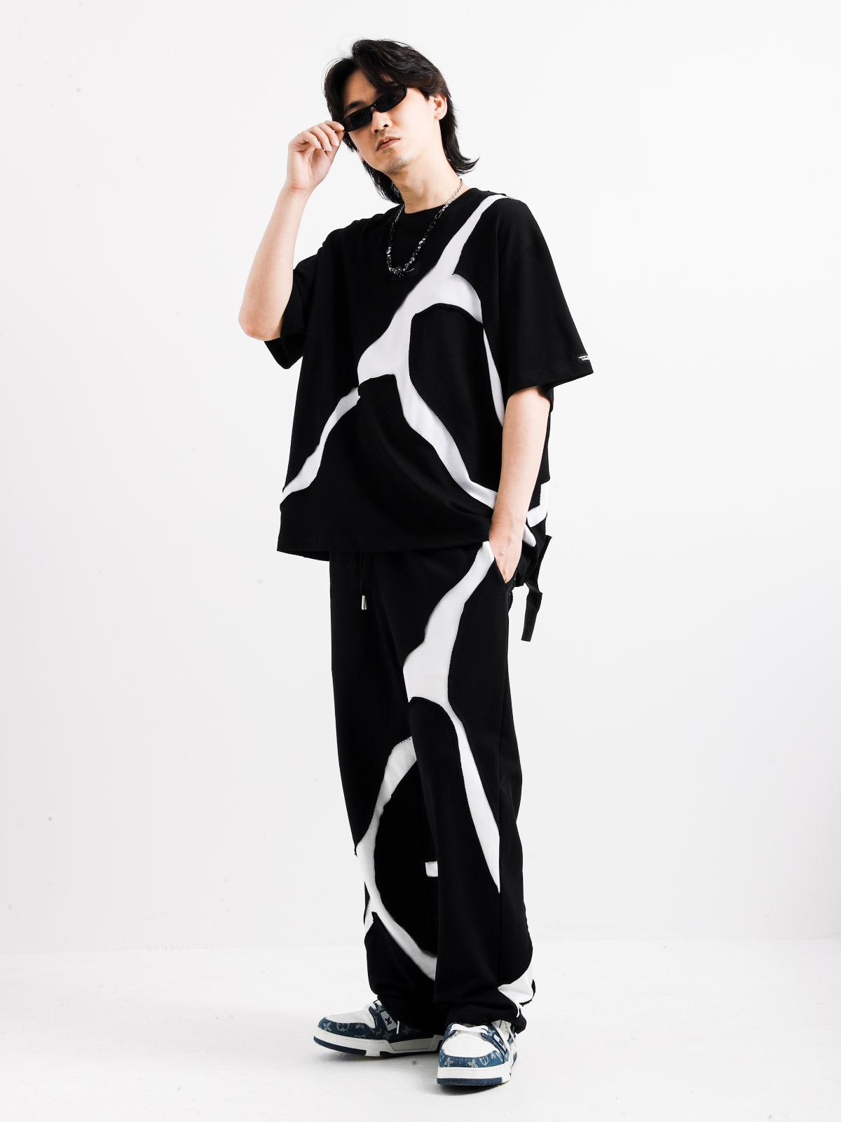 BLACK AND WHITE TROUSERS