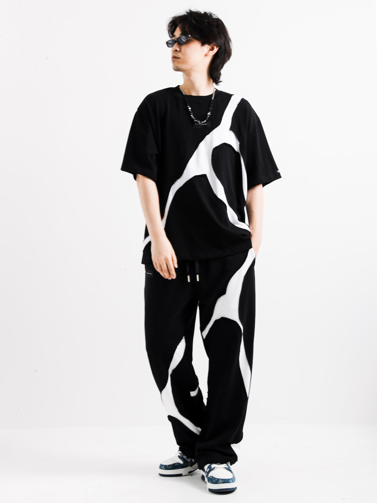BLACK AND WHITE TROUSERS
